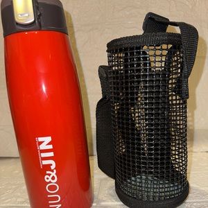 NUO & JIN insulated travel tumbler with holder